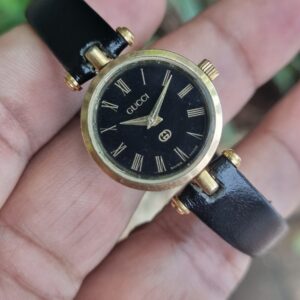 *Beautiful Vintage Gucci watch for sale*  : Black Generic Leather Strap. Roman numerals on a black dial