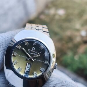 vintage Swiss made omax automatic stone studded dial